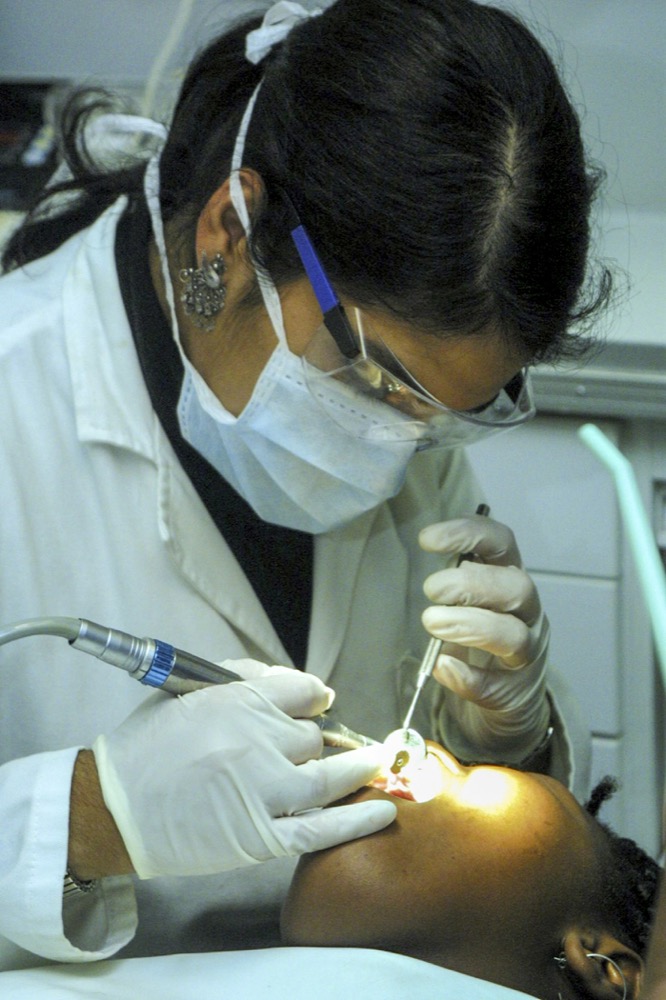 Dentist treating a patient